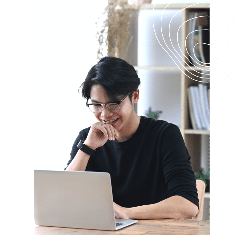 man looking at laptop to do local seo