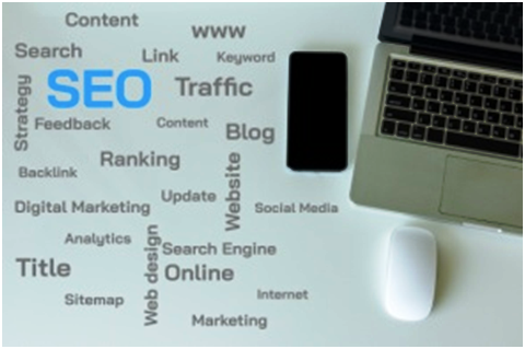 SEO-related keywords such as search, traffic, blog, ranking, and digital marketing displayed near a laptop, smartphone, and mouse, representing modern online strategies for improving website visibility.